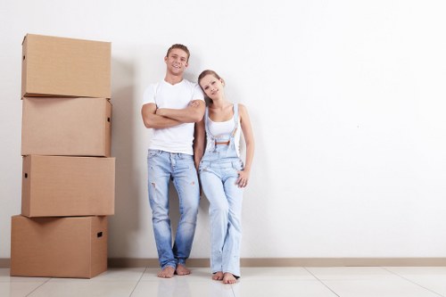 Professional local removals in Aldboroughhatch with moving boxes and furniture
