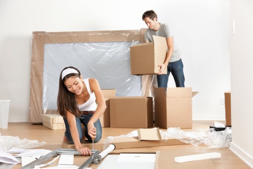 Customer placing goods into a self-storage unit at the start of the agreement